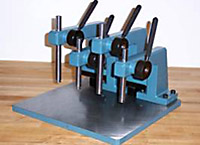 Four Manual Presses Mounted on Special Base